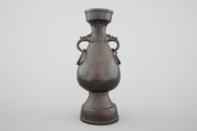 A Chinese bronze elongated bottle-shaped vase, Ming Dynasty