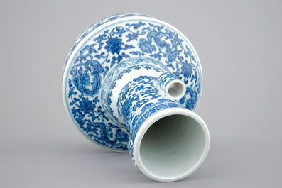 A Chinese blue and white Ming-style porcelain &quot;arrow&quot; vase with lotus scrolls, 19/20th C.