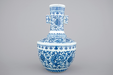 A Chinese blue and white Ming-style porcelain &quot;arrow&quot; vase with lotus scrolls, 19/20th C.
