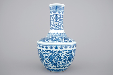 A Chinese blue and white Ming-style porcelain &quot;arrow&quot; vase with lotus scrolls, 19/20th C.