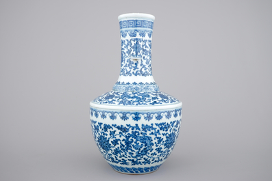 A Chinese blue and white Ming-style porcelain &quot;arrow&quot; vase with lotus scrolls, 19/20th C.