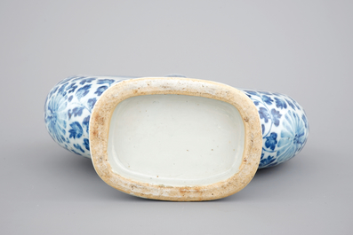 A Chinese blue and white porcelain moon flask with a fine landscape amidst lotus scrolls, 19th C.