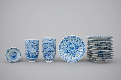 A set of 12 Chinese porcelain blue and white cups and saucers, 19th C