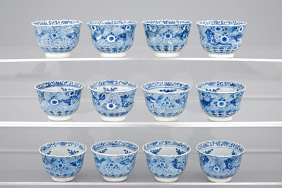 A set of 12 Chinese porcelain blue and white cups and saucers, 19th C