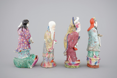 A set of four Chinese famille rose porcelain figures, 19th C.