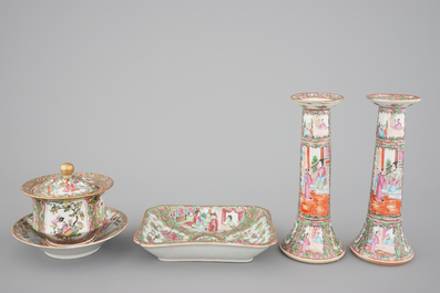 A group of Chinese Canton famille rose wares: a pair of candlesticks, a covered bowl on stand and a oblong tray, 19th C