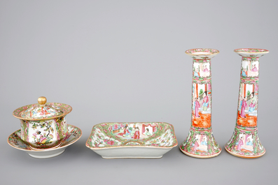 A group of Chinese Canton famille rose wares: a pair of candlesticks, a covered bowl on stand and a oblong tray, 19th C