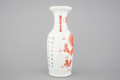 A tall Chinese iron-red porcelain vase with foo dogs, 19th C.