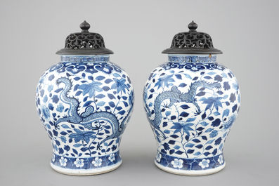 A pair of blue and white Chinese porcelain dragon vases, 19th C.