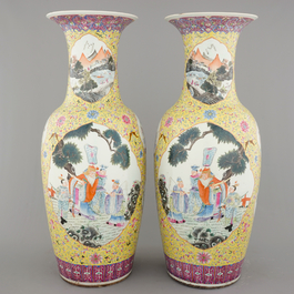 A massive pair of Chinese famille jaune and rose vases with elephants, early 19th C.