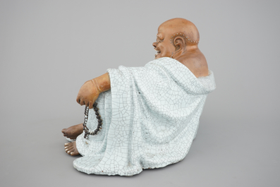 A massive Chinese signed Shiwan stoneware figure of a seated Buddha, 19/20th C.