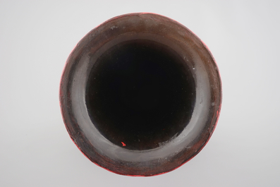 A tall Chinese cinnabar laquer vase, 18/19th C.