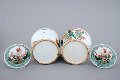 A pair of Chinese wucai porcelain warrior vases with covers, 19/20th C.