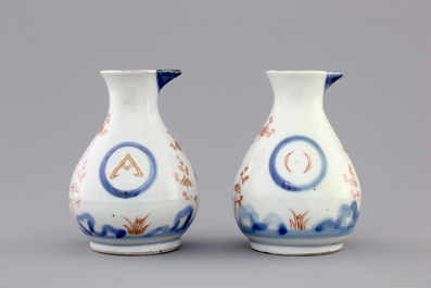 A pair of Japanese Arita porcelain oil and vinegar jugs, 18th C.