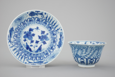 A set of six Chinese blue and white cups and saucers with fish, 19th C.