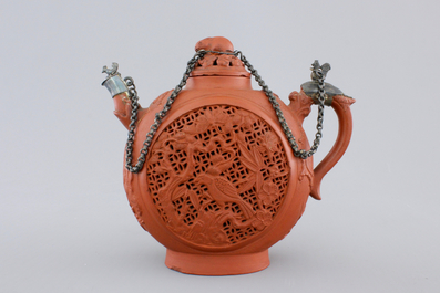 A Chinese silver-mounted open-worked Yixing stoneware teapot, 18th C.