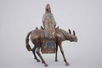 A Japanese champlev&eacute; enamel and bronze figure of a sage riding a donkey, 19th C.