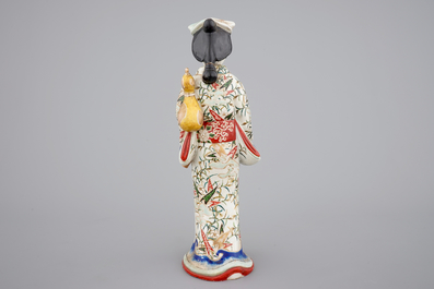 A tall Japanese Arita porcelain model of a &ldquo;courtesan&rdquo;, 17/18th C.