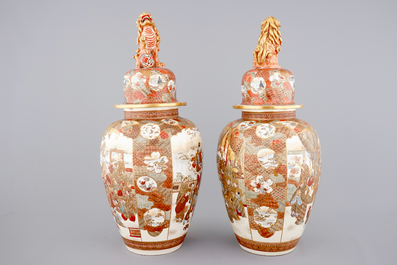 A very tall pair of Japanese Satsuma vases and covers, 19th C.