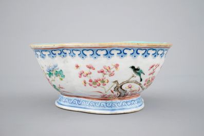 A Chinese famille rose bowl and two famille rose bowls with flowers