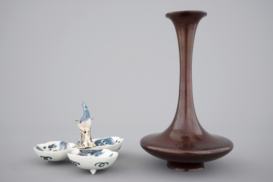 A fine Japanese bronze vase, 19th C. and an Imari spice box with dolphin finial, 17/18th C.