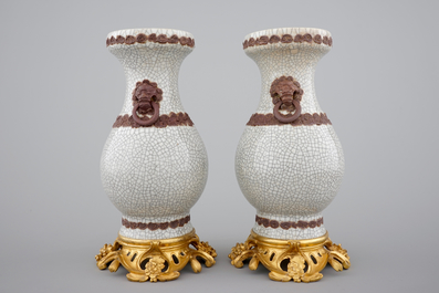 A pair of Chinese crackle glaze vases on bronze mounts, 19th C.