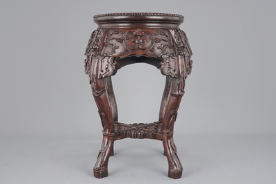 A finely carved Chinese hardwood marble top vase stand, 19th C.