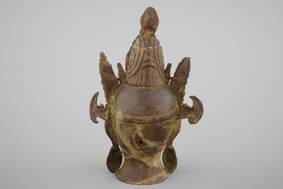 A tall gilt bronze head of a Boddhisatva with semi-precious stones, Tibet, 17/18th C.