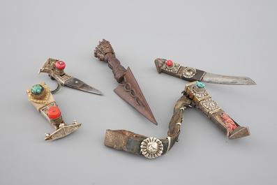 A Tibetan iron Purbu, 13/14th C. and two knives in silver and semi-precious stones, 19/20th C.