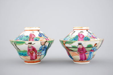 A pair of Chinese Canton famille rose cups, saucers and covers, Daoguang, 19th C.