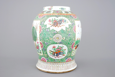 A Chinese famille rose porcelain vase with a peacock, 19th C.