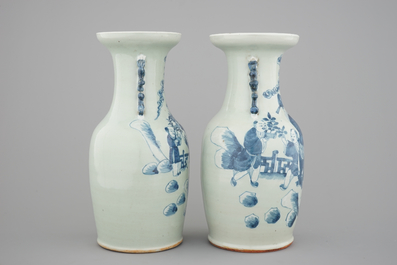 A pair of blue and white Chinese vases on celadon ground with playing boys 19th C.