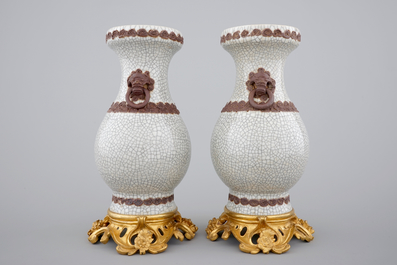 A pair of Chinese crackle glaze vases on bronze mounts, 19th C.