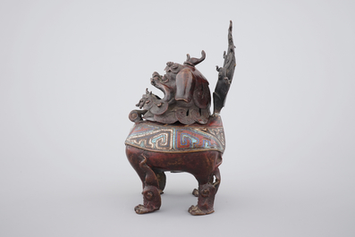 A Chinese dragon censer in champlev&eacute; enameled bronze, 18/19th C.