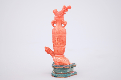 A Chinese carved red coral turtle snuff bottle on stand, 19th C.