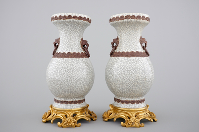 A pair of Chinese crackle glaze vases on bronze mounts, 19th C.