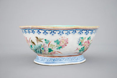 A Chinese famille rose bowl and two famille rose bowls with flowers