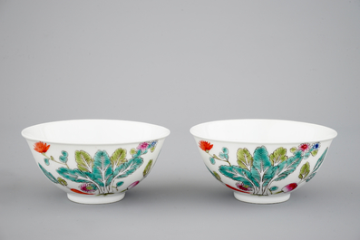 A Chinese famille rose bowl and two famille rose bowls with flowers