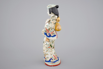 A tall Japanese Arita porcelain model of a &ldquo;courtesan&rdquo;, 17/18th C.