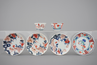 Twelve Japanese porcelain cups and saucers, Imari and Kakiemon, 18th C.