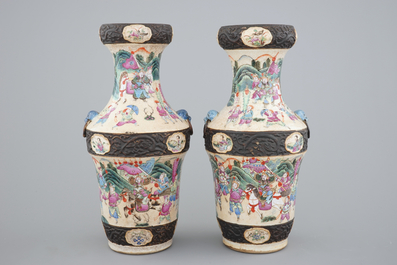 A pair of Chinese Nanking famille rose vases with warrior scenes, 19th C.