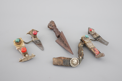 A Tibetan iron Purbu, 13/14th C. and two knives in silver and semi-precious stones, 19/20th C.