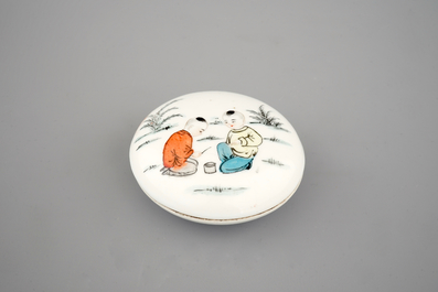 A round Chinese porcelain box and cover with erotic scenes inside, 20th C.