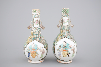 A pair of Canton famille verte vases and a pink ground Canton vase, 19th C.