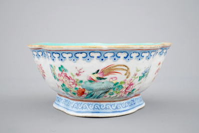 A Chinese famille rose bowl and two famille rose bowls with flowers