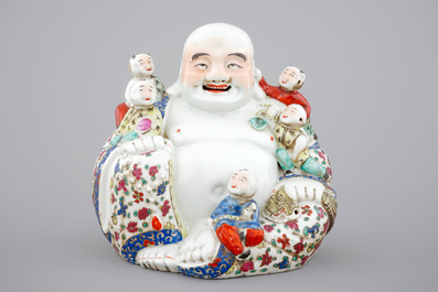 A Chinese famille rose Buddha Hotei with children, 19/20th C.