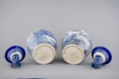 A tall pair of Japanese Arita porcelain blue and white vases and covers, ca. 1860