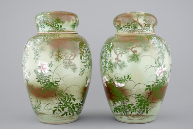 A tall pair of Japanese celadon-ground vases with covers, ca. 1880