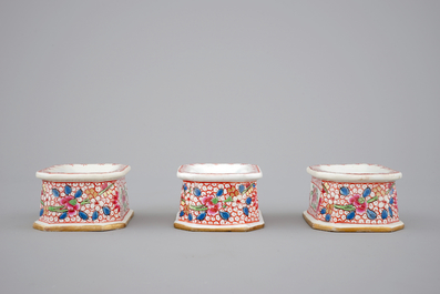 Three Chinese porcelain famille rose salts and five small plates, 18th C.