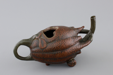 A Chinese Yixing pewter-mounted buddha's hand shaped teapot, 18/19th C.